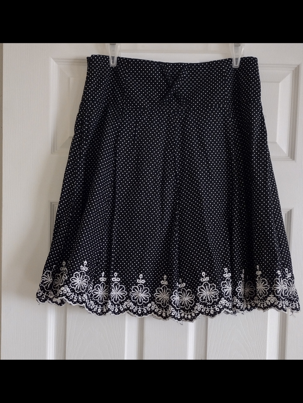 Vintage Tracy Evans A-line skirt features a black and white polka dot pattern